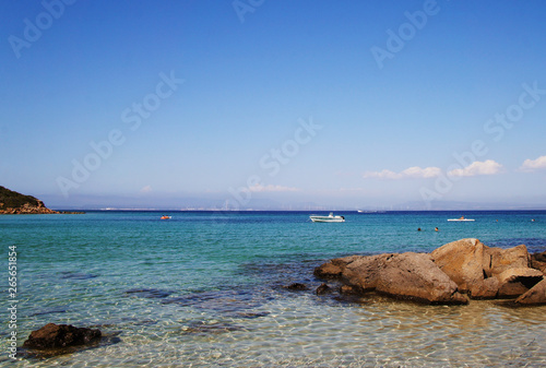 White ship in a blue lagoon at sea in summer.