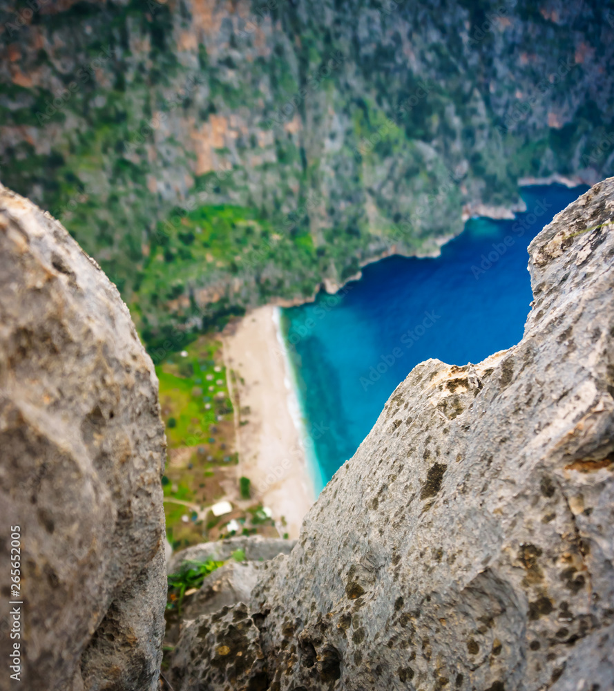 The Butterfly Valley (Kelebekler Vadisi) in Oludeniz, Fethiye, Mugla, Turkey. Lycian way. Summer and holiday concept The Butterfly Valley (Kelebekler Vadisi) in Oludeniz, Fethiye, Mugla, Turkey. Lycian way. Summer and holiday concept