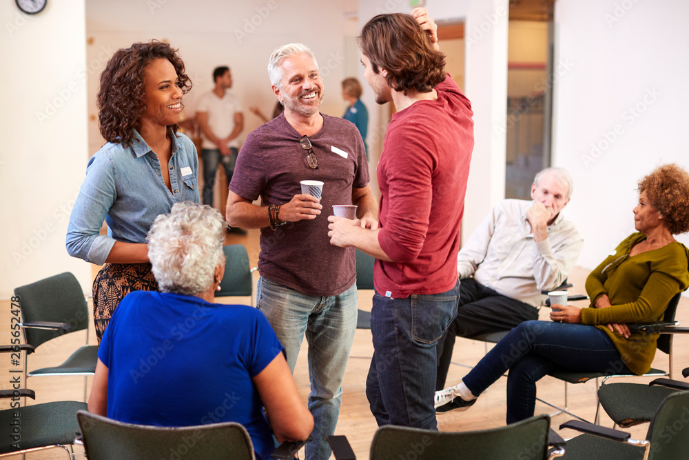 Ταπετσαρία Group Of People Socializing After Meeting In Community Center