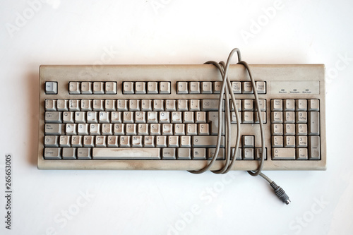 Fotografie Old and dirty computer keyboard