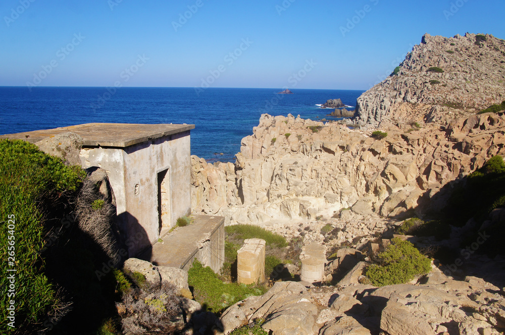 Old ancient house in the rocks of the mountains near the sea. Old ancient house in the rocks of the mountains near the sea.