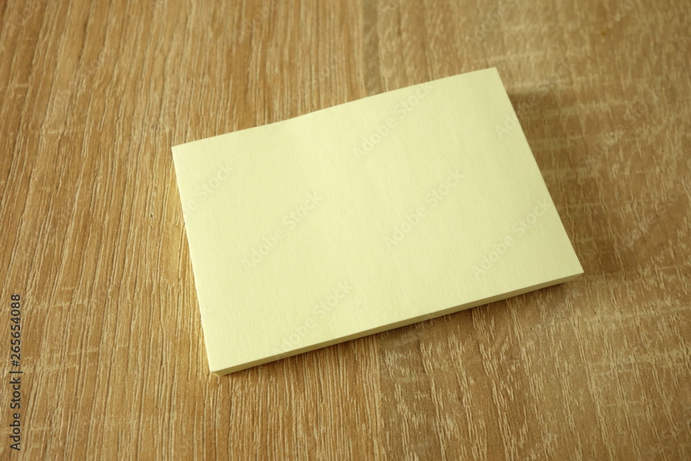 Blank brochure or leaflet mock-up on wooden background Blank brochure or leaflet mock-up on wooden background