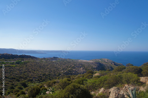 View of the blue azure sea lagoon gulf of the ocean. Summer heat nature on the southern island of the mountain rocks stones. © Payllik