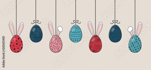 Hanging hand drawn Easter eggs with bunny ears. Vector