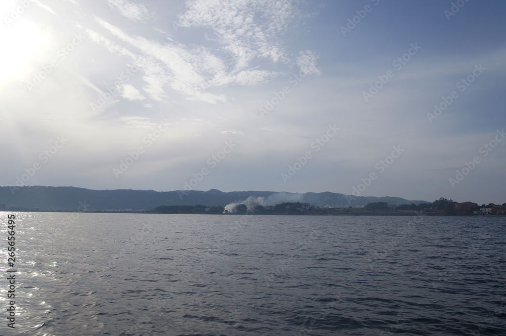 View from the sea to the shore and cliffs. View from the sea to the shore and cliffs.