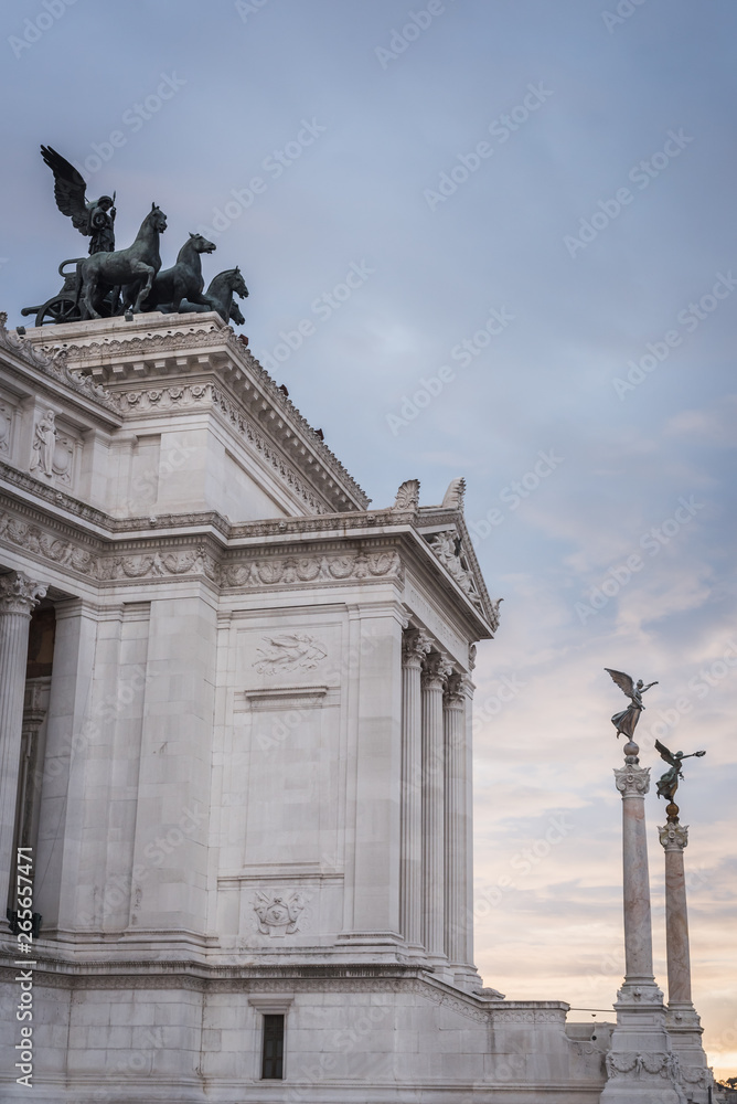 Columns and statues at the entrance of the Vittorio Emanuele II monument in Rome