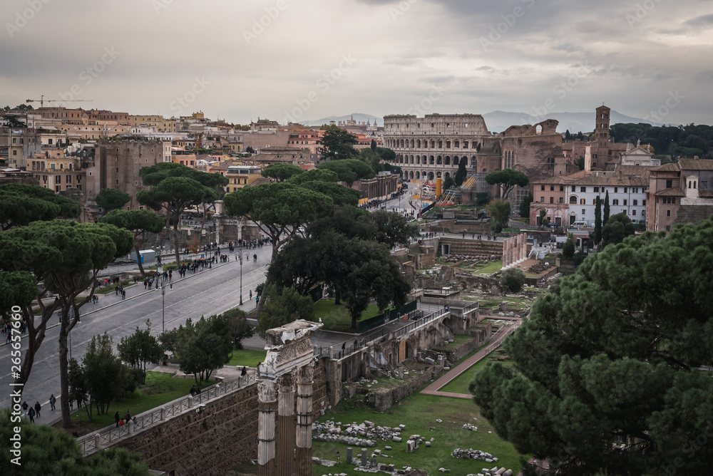 The ruins and the Colosseum of Rome from the monument Vittorio Emanuele II