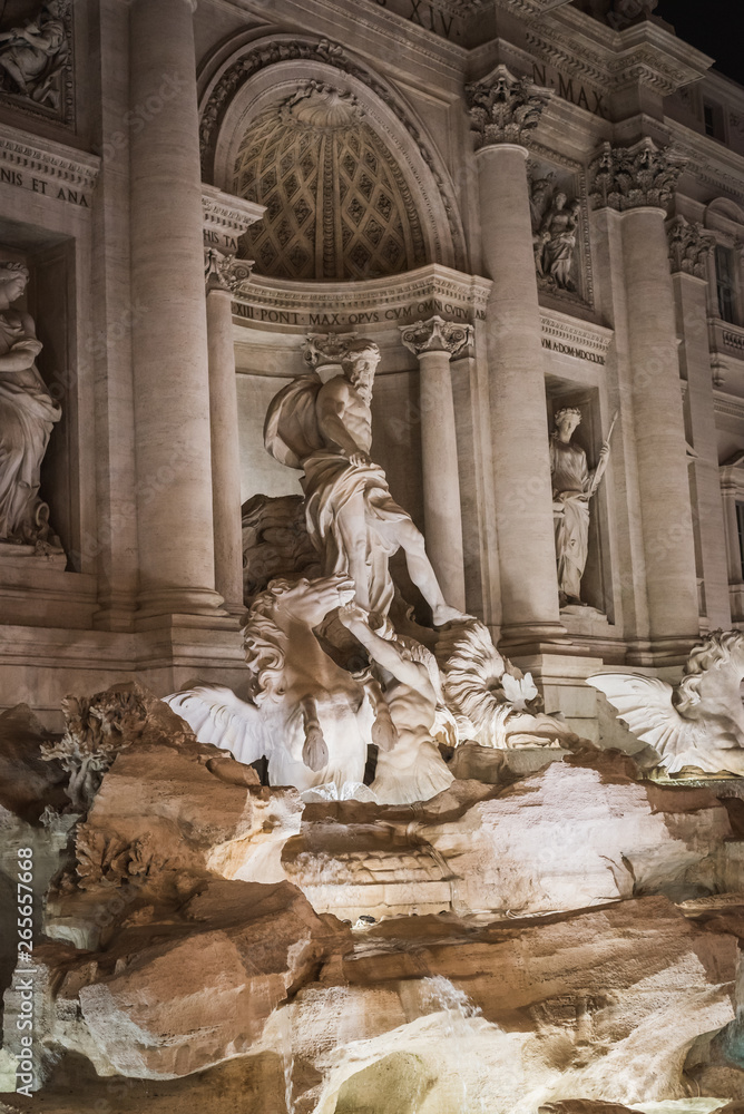 The Trevi Fountain and Neptune at night in Rome