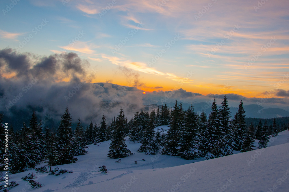 Amazing landscape in the winter mountains at sunrise