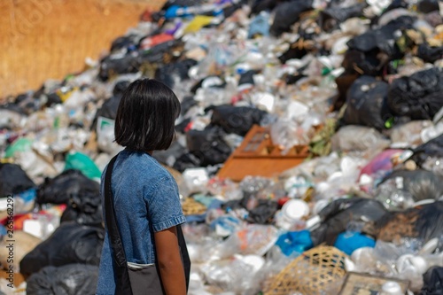Children find junk for sale and recycle them in landfills, the lives and lifestyles of the poor, Child labor, Poverty and Environment Concepts