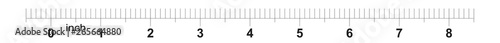 8 inch tape measure ruler with 0.1 inch markings. Metric grid.