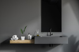 Gray bathroom sink with mirror
