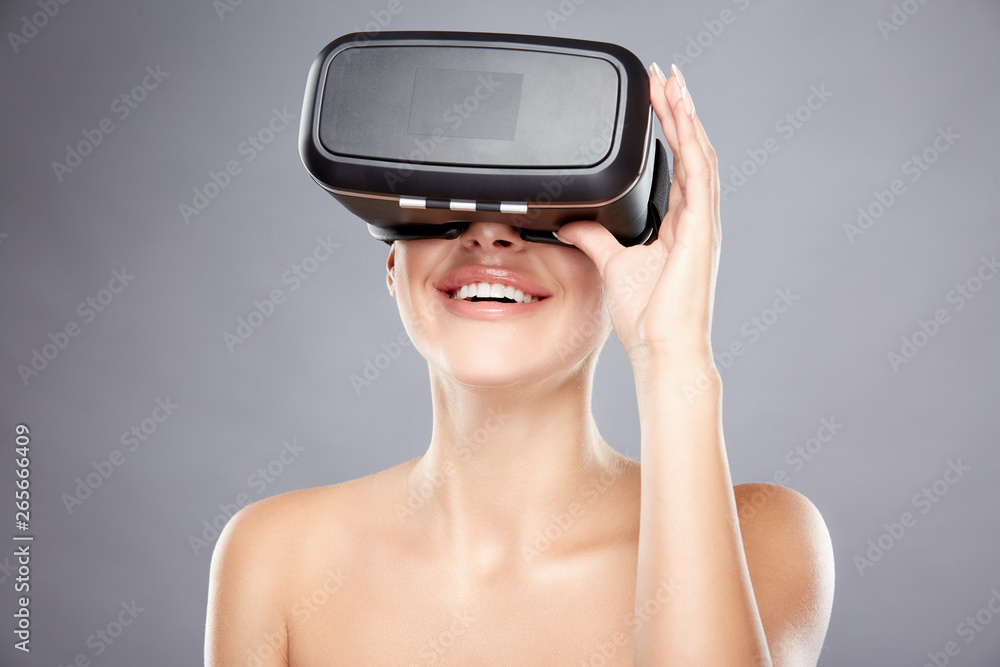 Close up portrait of girl wearing virtual reality glasses