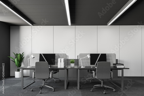 White open space office with gray tables