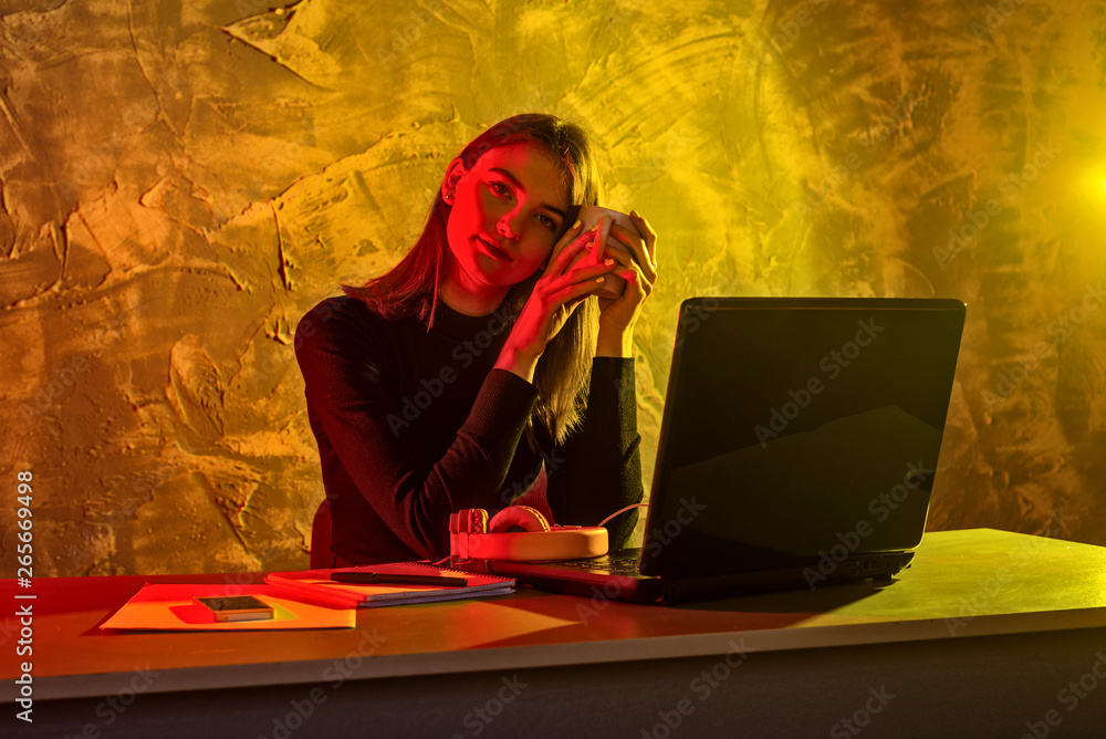 Business woman working on a laptop, stressful situation. Business woman working on a laptop, stressful situation.