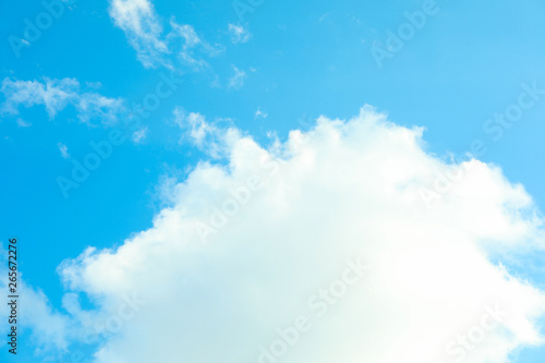 Beautiful white fluffy clouds on a light blue sky background. Wonderful skies