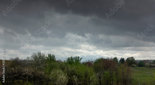Dramatic Landscape with storm clouds in the sky © Chepko Danil