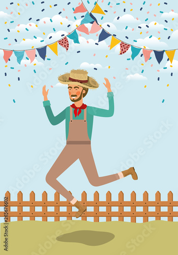 young farmer celebrating with garlands and fence
