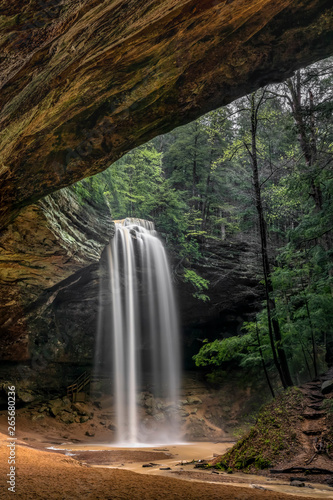 Ash Cave Overflow - A beautiful plunging waterfall adorns Ash Cave  an enormous sandstone recess cave  perhaps the most spectacular scene of many beautiful ones in the Hocking Hills of Ohio. 