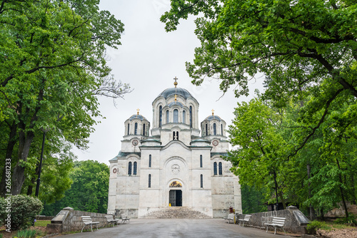 the old Orthodox church is surrounded by forests