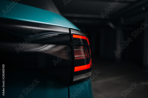 Obraz na płótnie Led taillight on modern crossover at underground parking