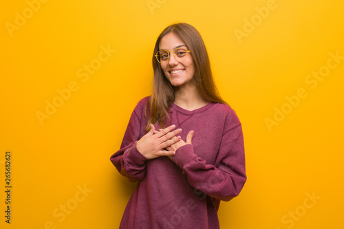 Young casual woman doing a romantic gesture