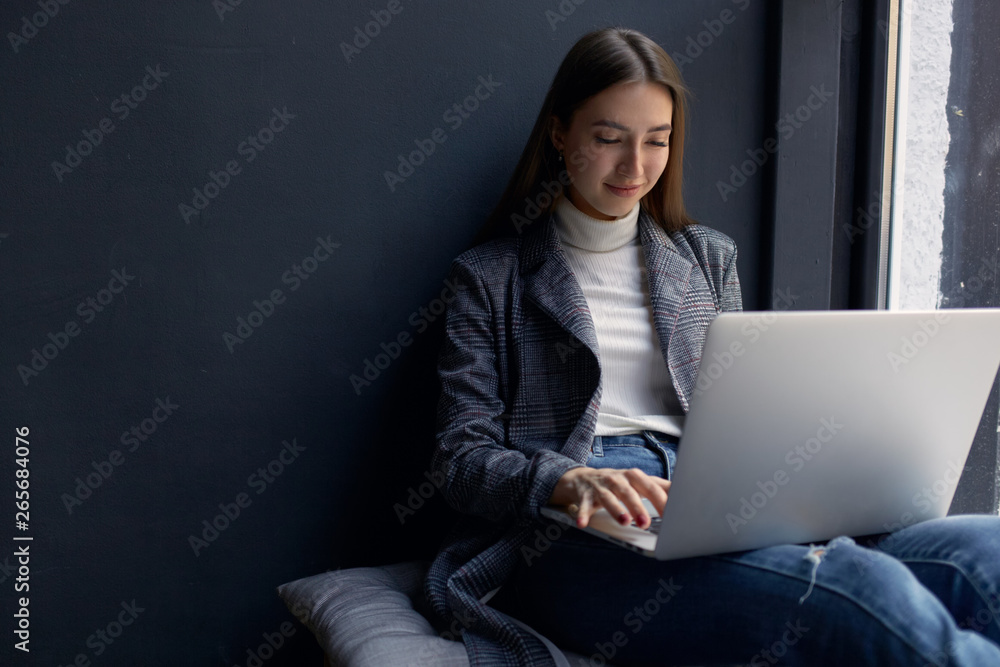 Education technology and internet concept. Girl in stylish blazer work with laptop in cafe. Education technology and internet concept. Girl in stylish blazer work with laptop in cafe.