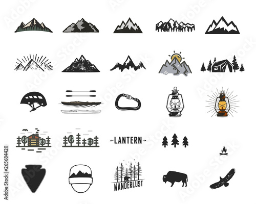 Vintage camping icons and adventure symbols illustrations set. Hiking shapes of mountains, trees, wild animals and others. Retro monochrome design. Can be used for t shirts, prints. Stock vector