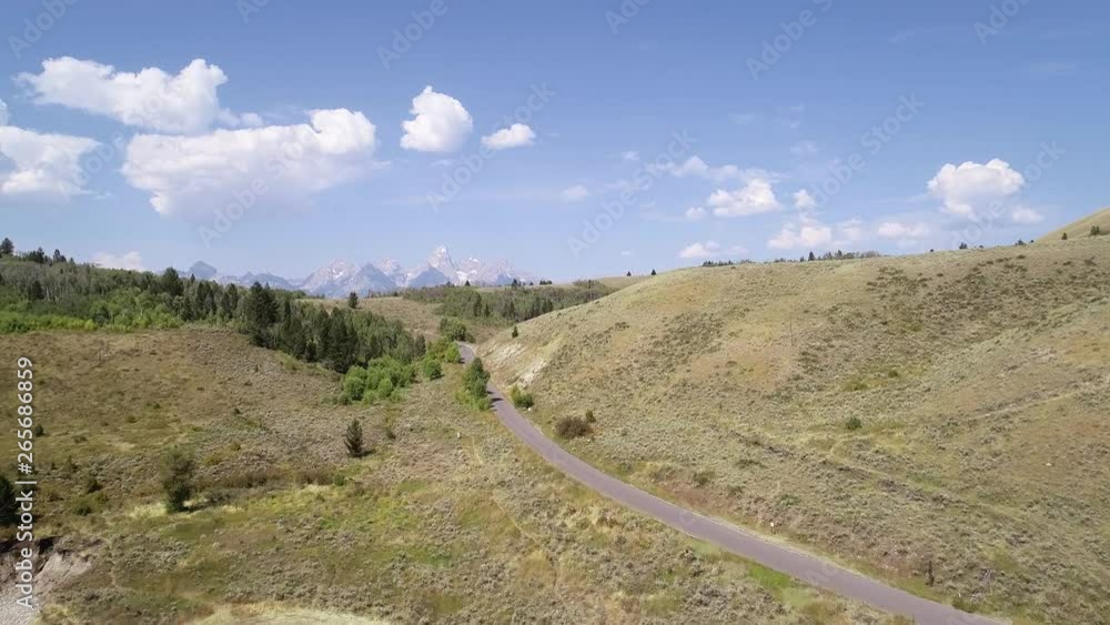 Aerial shot near amazing Grand Teton mountain range and national park Aerial shot near amazing Grand Teton mountain range and national park