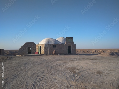 mosque in middle of desert in central Iran photo