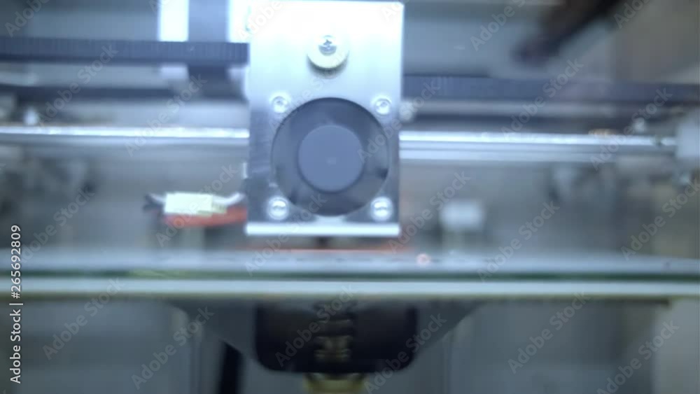 3D diy printer printing plastic mechanical parts in timelapse.An open source diy 3d printer is printing gears and pulleys,using disposable biodegreadable PLA material (filament) 3D diy printer printing plastic mechanical parts in timelapse.An open source diy 3d printer is printing gears and pulleys,using disposable biodegreadable PLA material (filament)