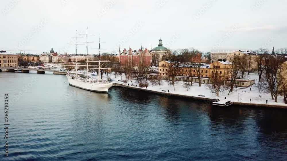 Trucking Aerial Shot of a Snowcapped Skeppsholemn Island in Stockholm Trucking Aerial Shot of a Snowcapped Skeppsholemn Island in Stockholm