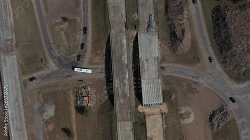 Aerial footage of road construction in Latvia. Suitabe to show road construction work at spring or autumn. photo