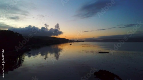Wallpaper Mural Drone moving forwards over coastline reflections in water at sunset at Salen on the Isle of Mull Torontodigital.ca