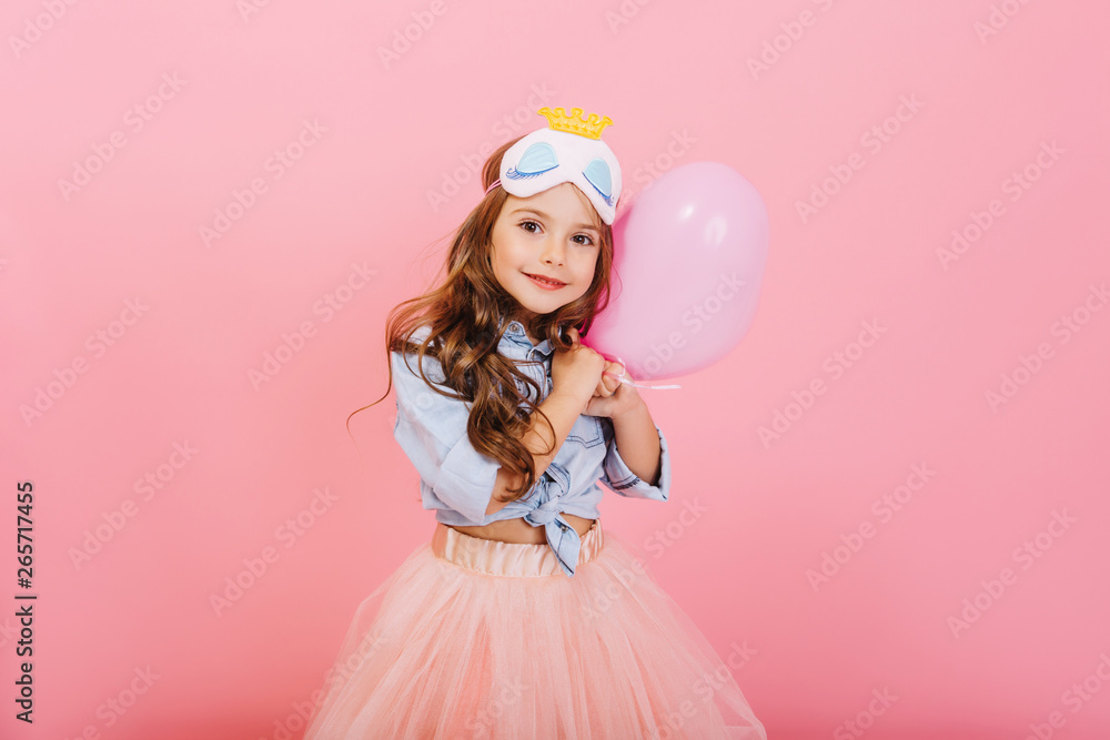Pretty sweet little girl with long brunette hair hugging balloon, looking to camera isolated on pink background. Beautiful joyful child having fun, celebrating birthday party, expressing positivity Pretty sweet little girl with long brunette hair hugging balloon, looking to camera isolated on pink background. Beautiful joyful child having fun, celebrating birthday party, expressing positivity