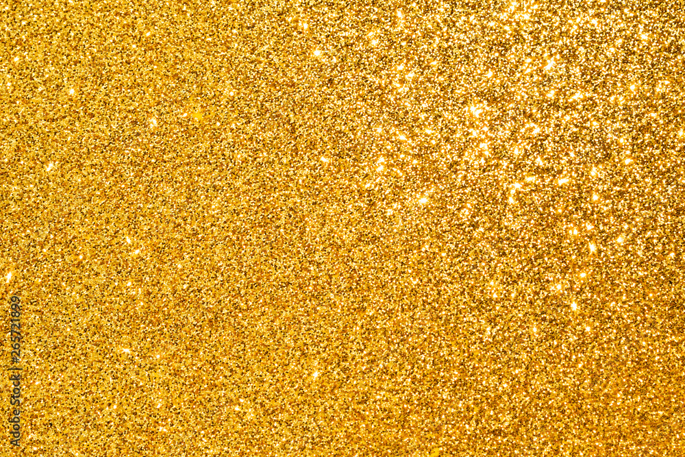 sparkle of golden glitter abstract background	