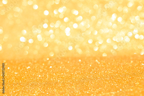 sparkle of golden glitter abstract background 