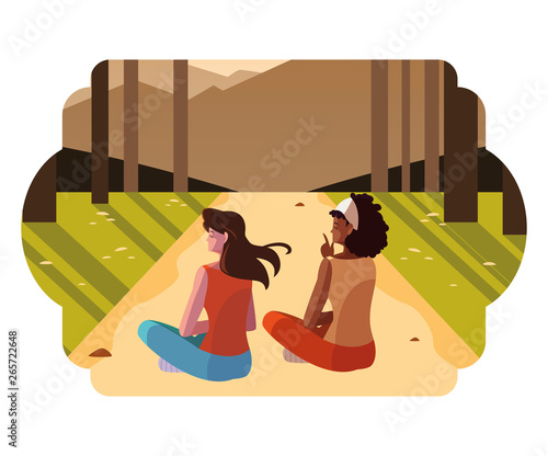 women couple contemplating horizon in the forest scene