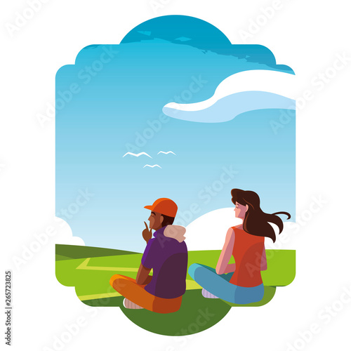 interracial couple contemplating the horizon in the field