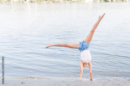 Young woman outdoors by the river