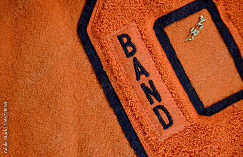 Band Award Patch Sewn on High School Letter Jacket with Trumpet Pin photo