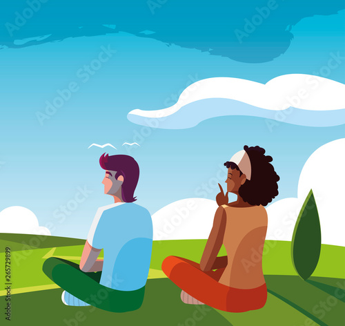 interracial couple contemplating the horizon in the field