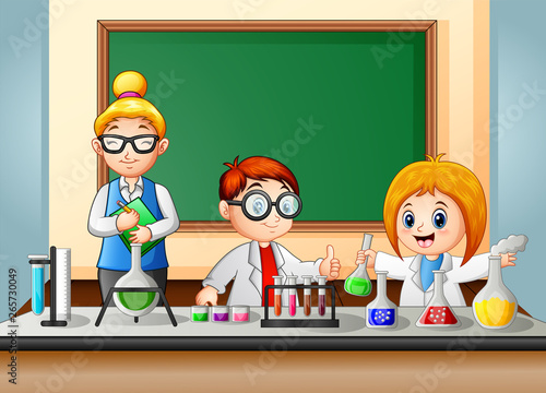 Students and Teacher are making chemical experiment