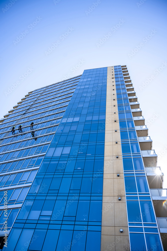 High-rise window washers are dangerous profession for real men High-rise window washers are dangerous profession for real men