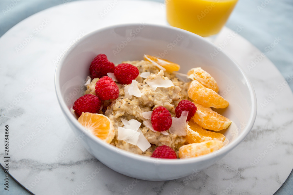 Mandarin, chia seeds, raspberry and porridge Mandarin, chia seeds, raspberry and porridge