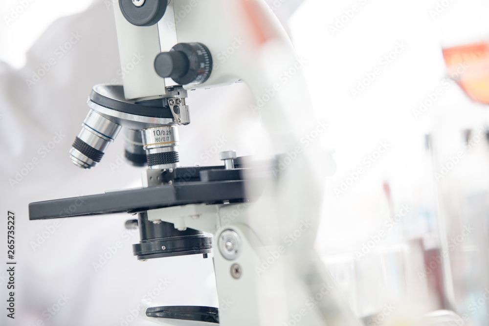Microscope for laboratory research. Photo of a medical microscope close-up. science laboratory research and development concept Microscope for laboratory research. Photo of a medical microscope close-up. science laboratory research and development concept