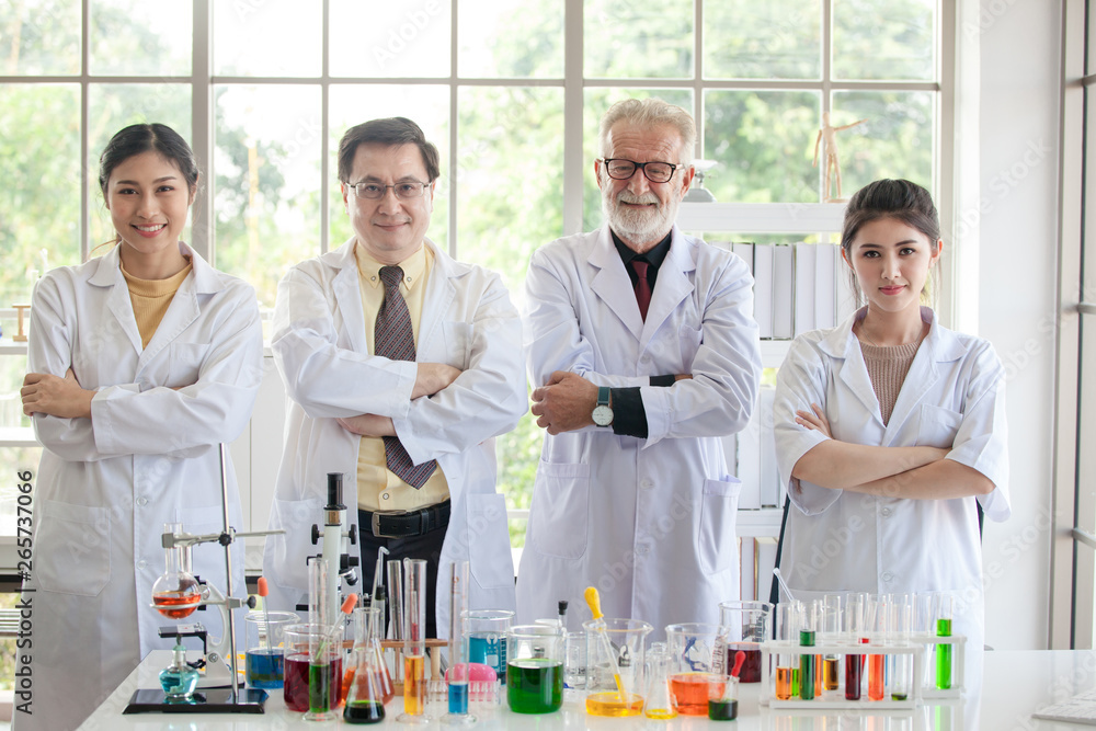 Group portrait of smiling scientists in the laboratory Group portrait of smiling scientists in the laboratory