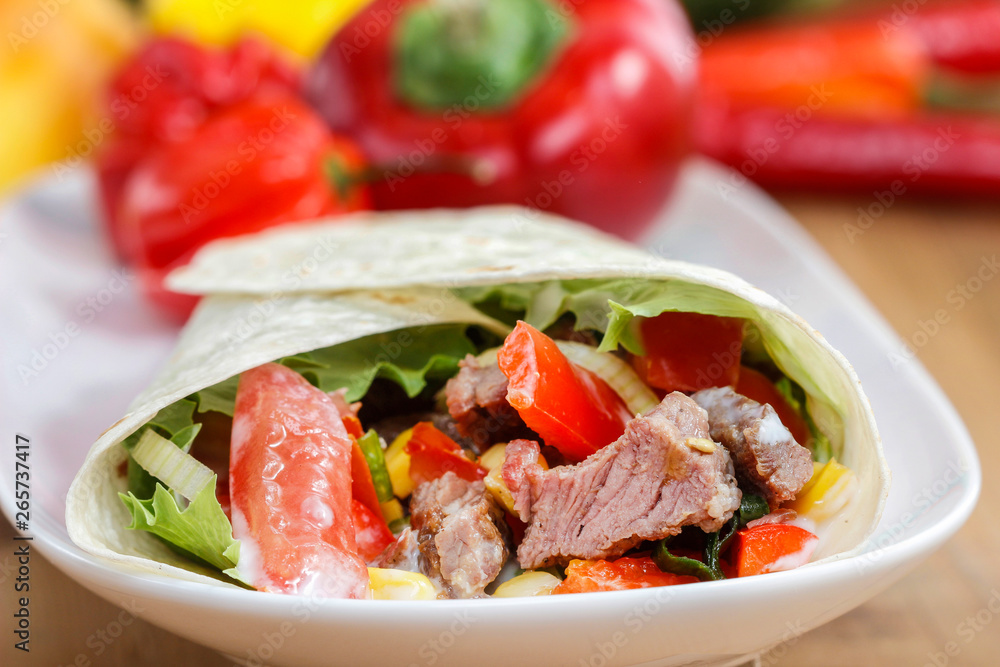 Tortilla on white plate.