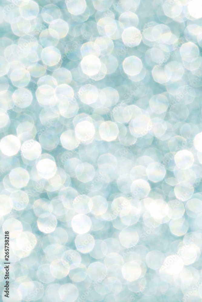 Blue glittering lights. Blurred abstract background.