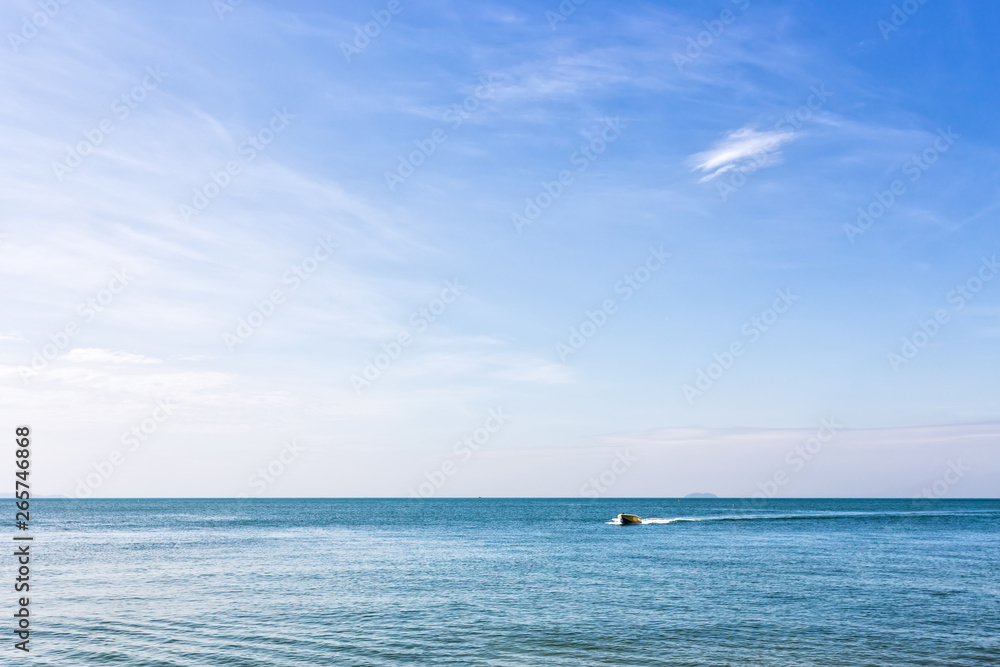 The sea and blue skies are beautiful and peaceful on the summer holidays. The sea and blue skies are beautiful and peaceful on the summer holidays.